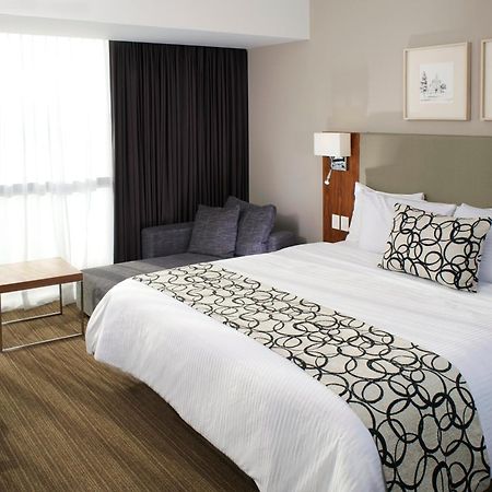 Casa Inn Premium Hotel Queretaro Miranda Extérieur photo A bed runner